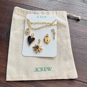 J. Crew NWT Gold tone Necklace with interchangeable charms Set and Dust Bag.